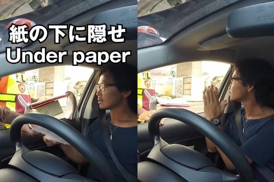 Японский турист разоблачил коррумпированного тайского инспектора дорожного движения в вирусном видео