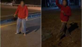 Тайская женщина произносит заклинания, отгоняющие злых духов, перед домом мужчины (видео)