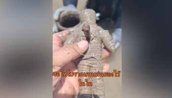 Запечатанный сосуд с оккультной куклой найден в реке Пинг