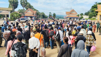 Большинство кхмерских рабочих остаются в Таиланде, несмотря на напряженность