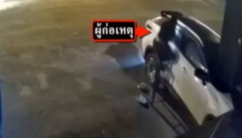 Трансженщина из Таиланда, пойманная на камеру CCTV, как она крадет у пьяного мужчины, спящего в машине