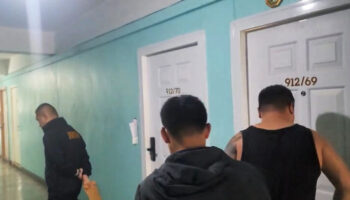 Китайский беглец, разыскиваемый за мошенничество, арестован в кондо в Хон Кэне.