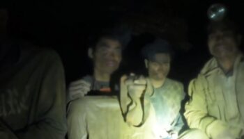 Пять trapped miners rescued in Laos flooded gold mine operation